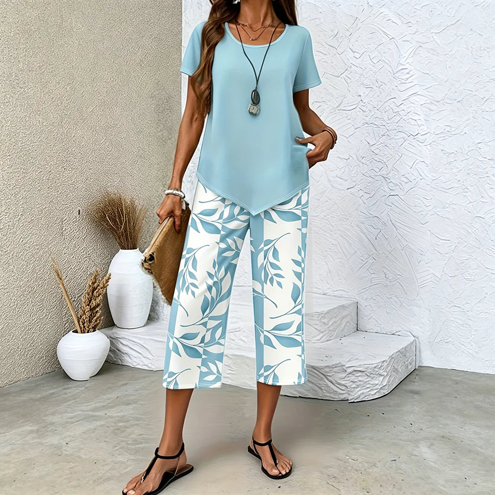 Ensemble d'été femme 2 pièces — pantalon imprimé feuilles et haut asymétrique respirant