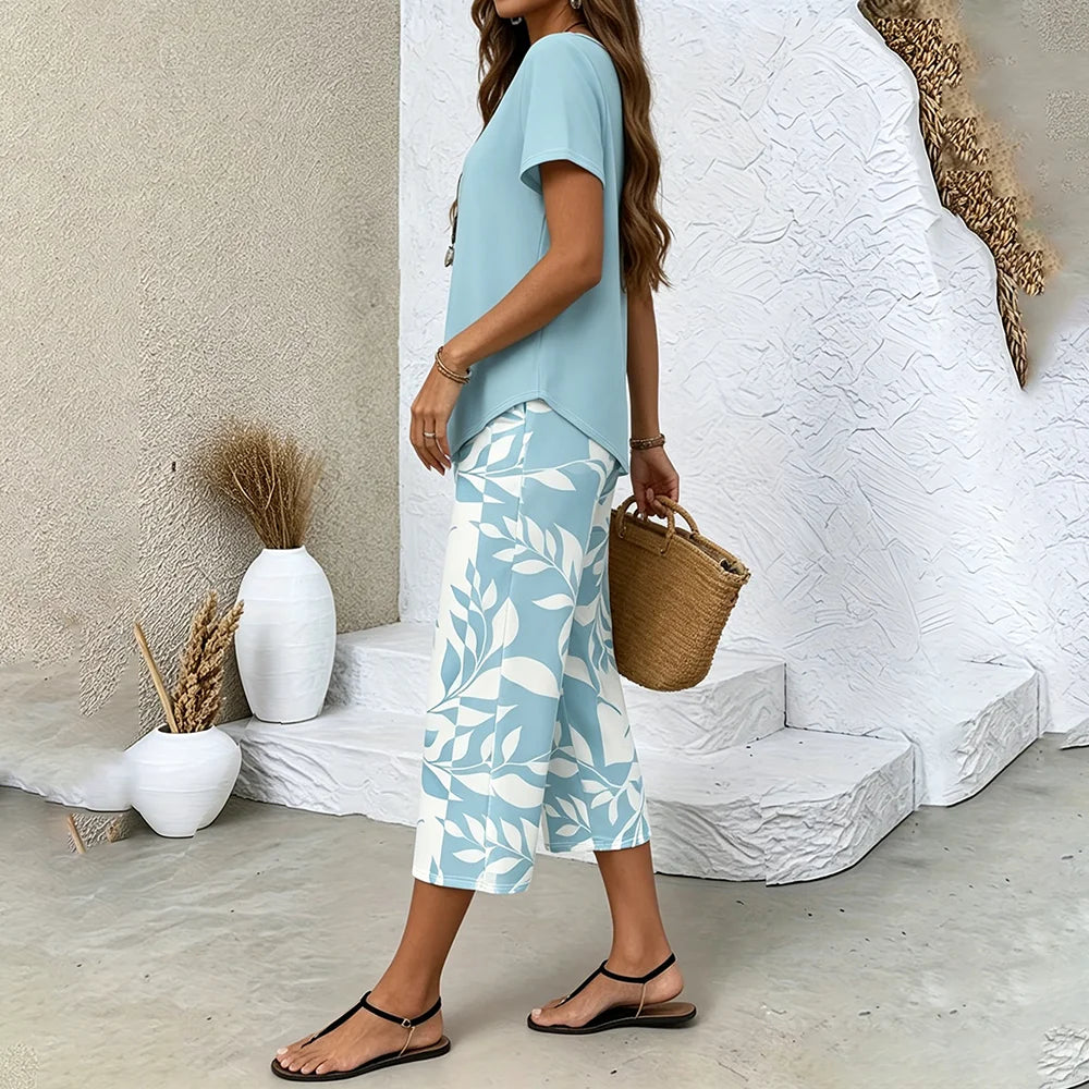 Ensemble d'été femme 2 pièces — pantalon imprimé feuilles et haut asymétrique respirant